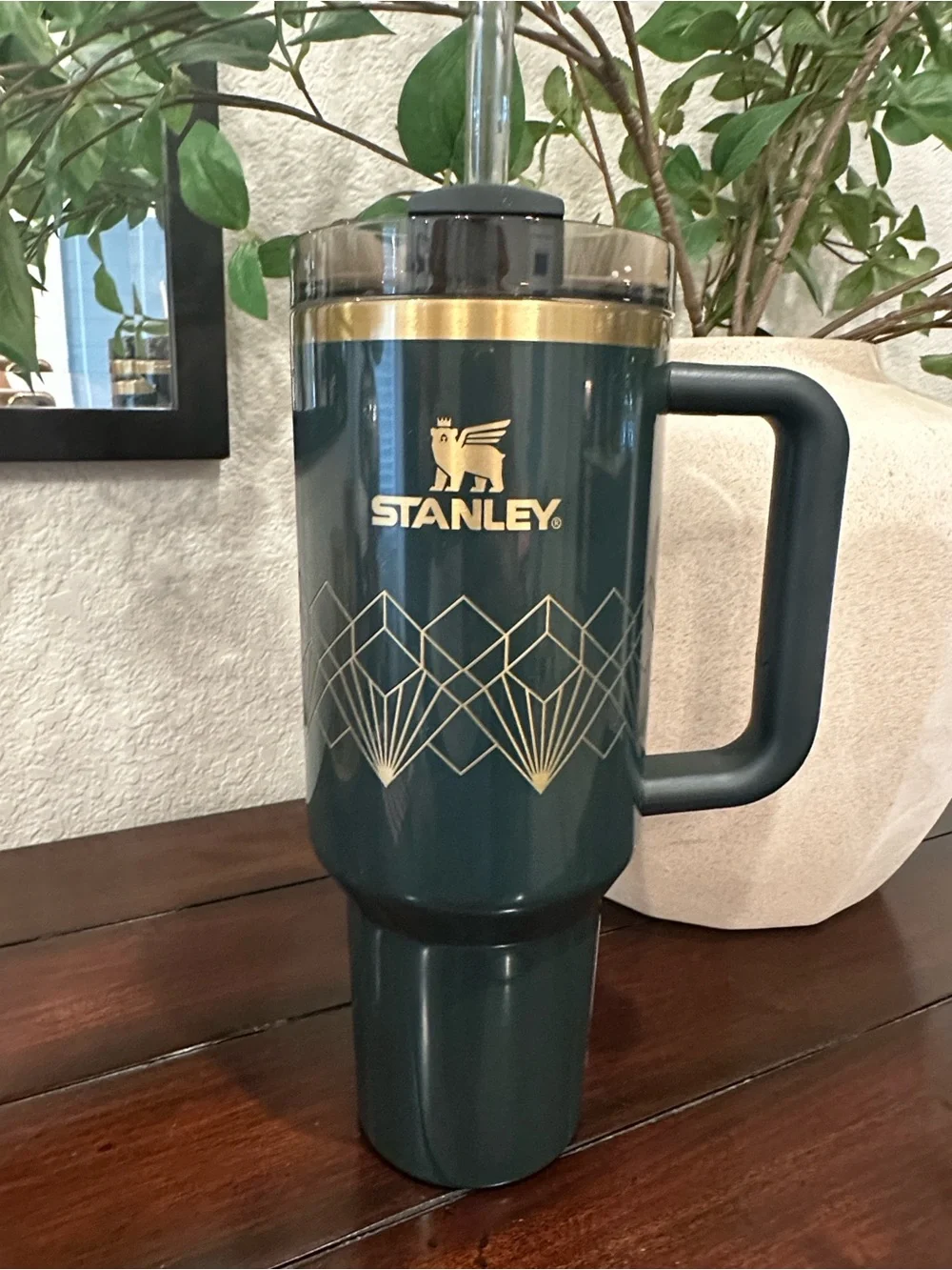 Stanley Dark Green Travel Mug with Gold Trim and Geometric Accent